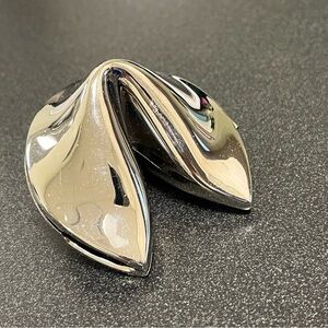 Chrome hinged fortune cookie trinket box.